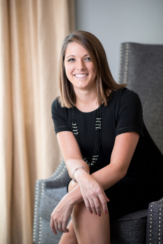 Commercial Headshot of a realtor with a natural smile and wrists crossed. Professional Portrait by Carrie Allen Charlotte NC Photographer